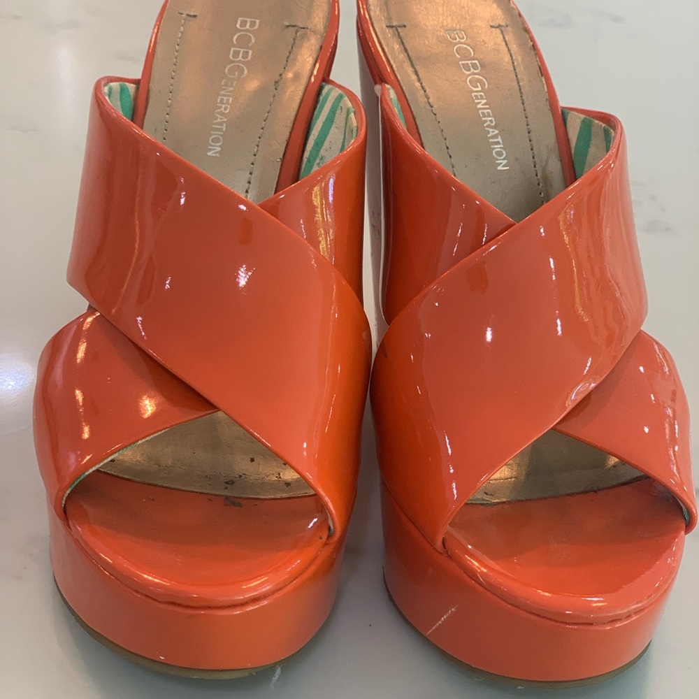 BCBGeneration Orange Patent Platform Wedges